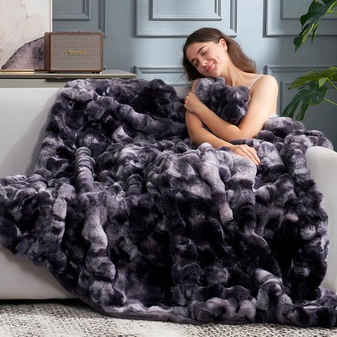 Cozy Bliss faux fur throw shows easy machine-wash care for long-lasting softness.