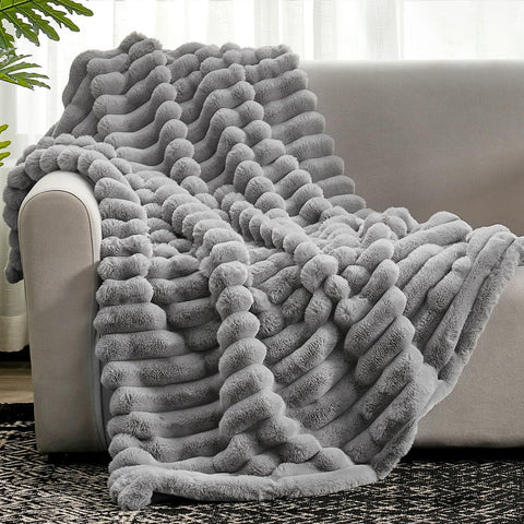 Cozy Bliss faux fur throw on couch for warm, inviting texture