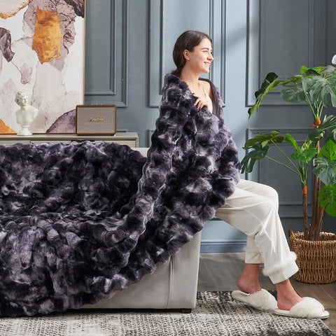 Cozy Bliss faux fur throw soft-face-side highlights luxurious plush feel.