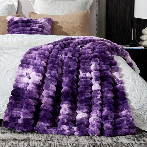 Machine-washable Cozy Bliss faux fur blanket simplifies care.