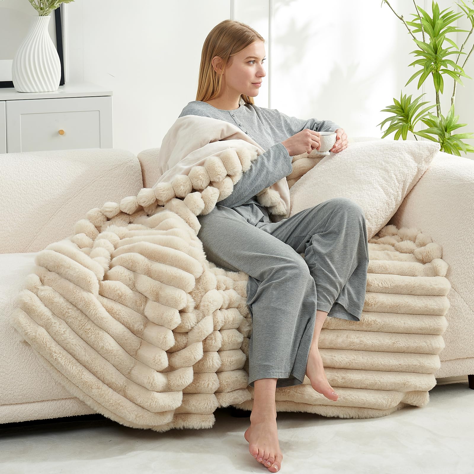 Cozy Bliss plush striped beige blanket adds textured warmth