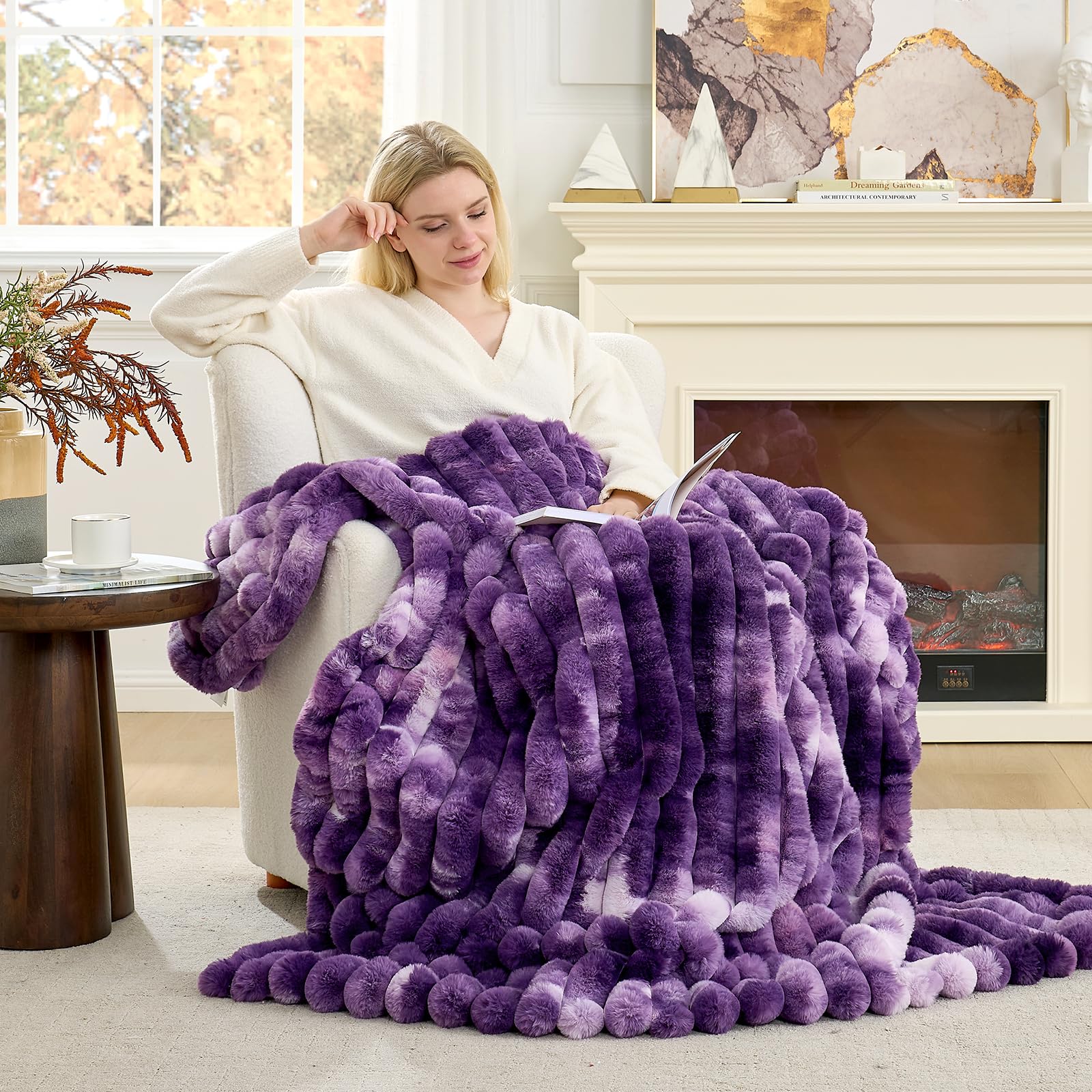 Cozy Bliss plush striped blanket draped over a sofa adds modern style and comfort.