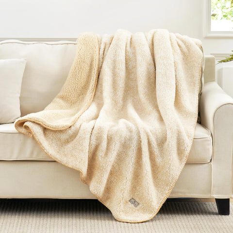 Cozy Bliss sherpa throw on couch adds plush warmth