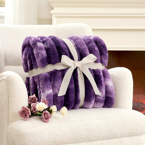 Cozy Bliss throw blanket on the bed enhances warmth and cozy ambience.