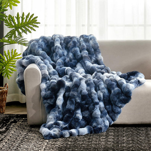 Cozy Bliss tie-dye blue throw close-up—soft faux fur and high-low wave design.