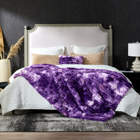 Tie-dye purple Cozy Bliss blanket complements living room color schemes.