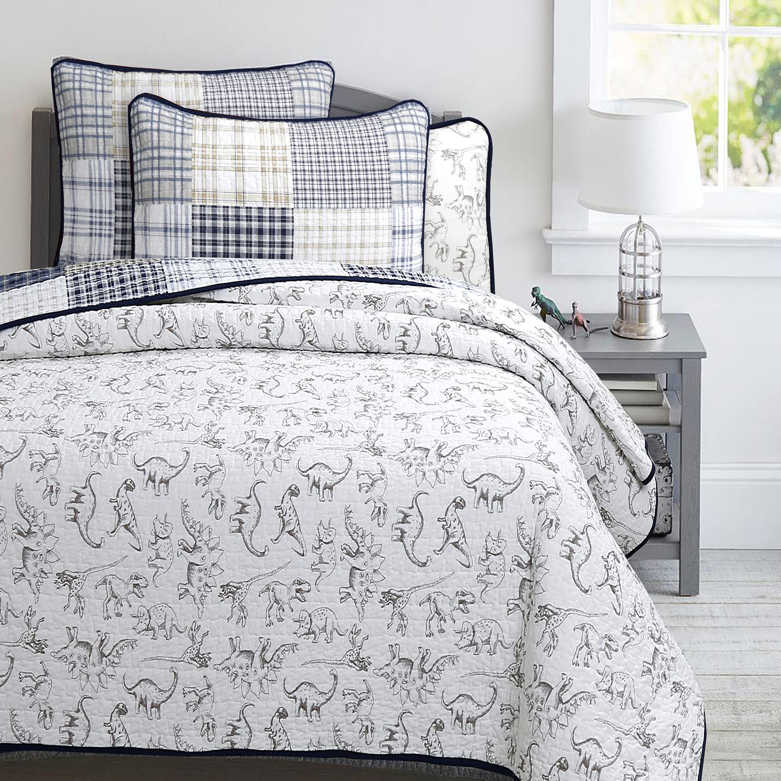 Sham detail from Cozy Line Benjamin dinosaur quilt for coordinated kids bedding