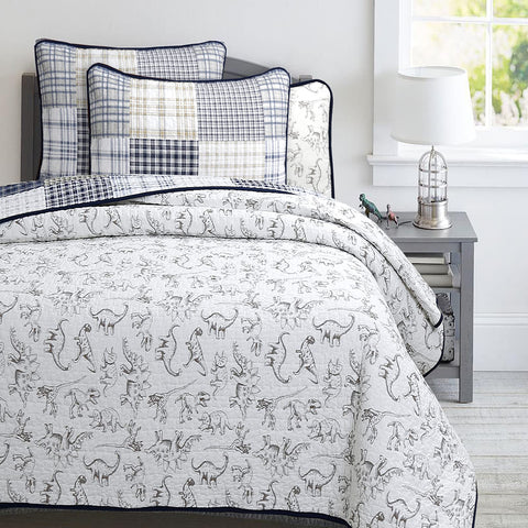 Sham detail from Cozy Line Benjamin dinosaur quilt for coordinated kids bedding