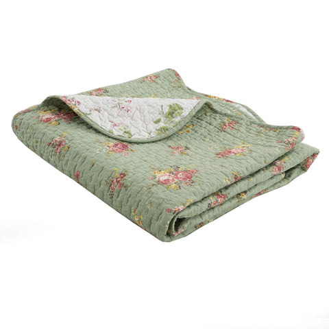 Cozy Line Blossom throw reverse design offers two looks.