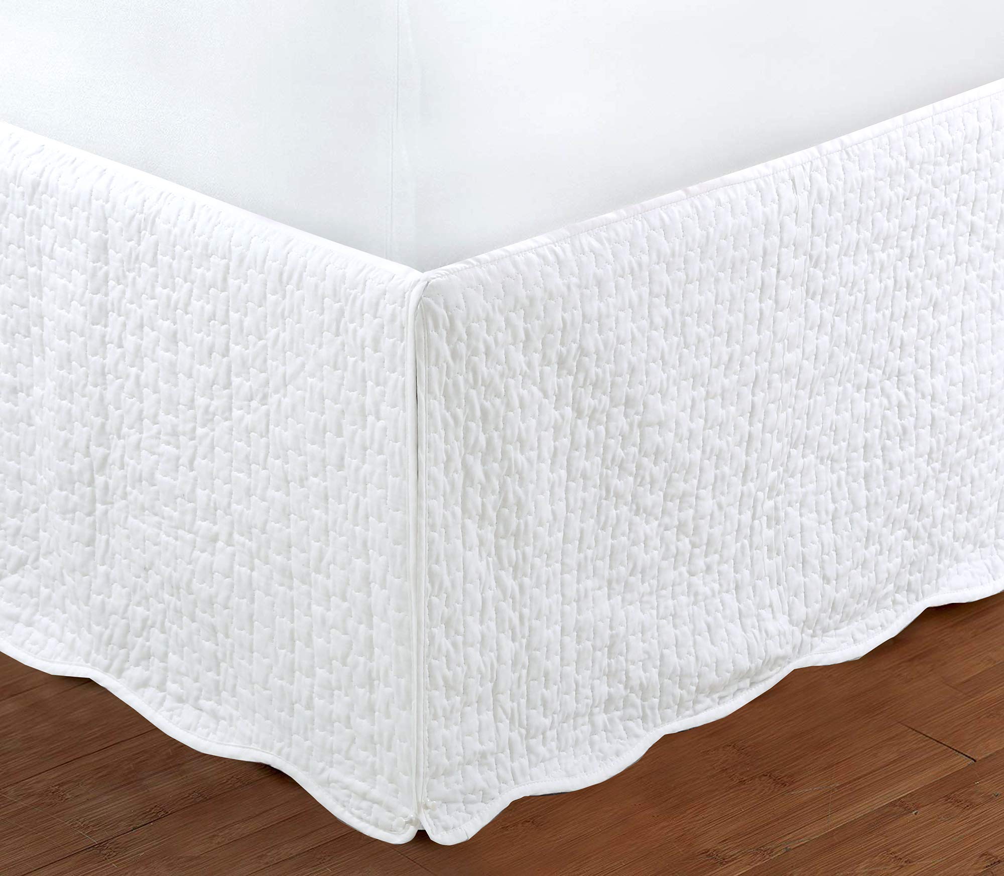 Cozy Line white quilted bed skirt with dust ruffle highlights elegant framing