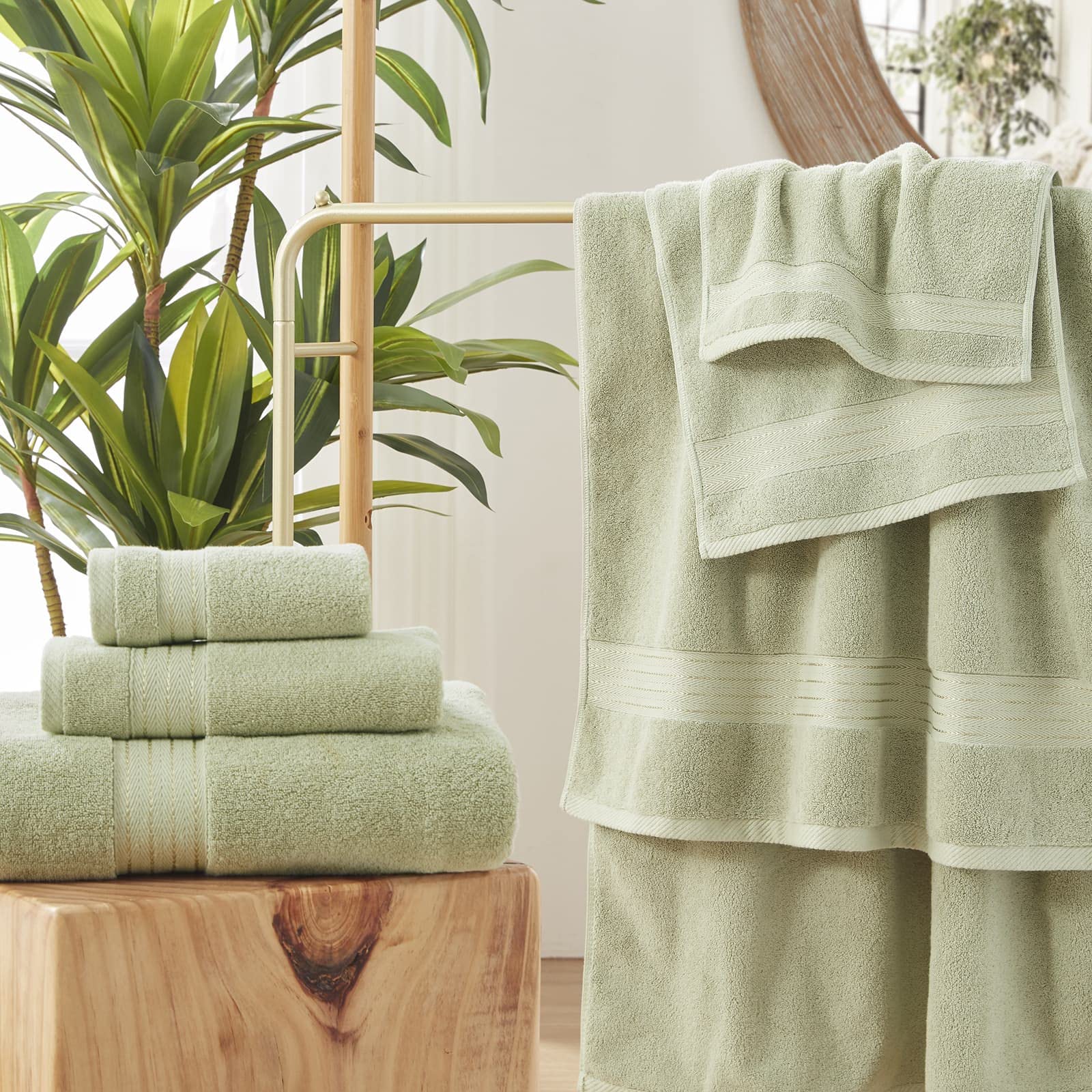 COZYART bath towels 27x54 displayed on rack for daily use.