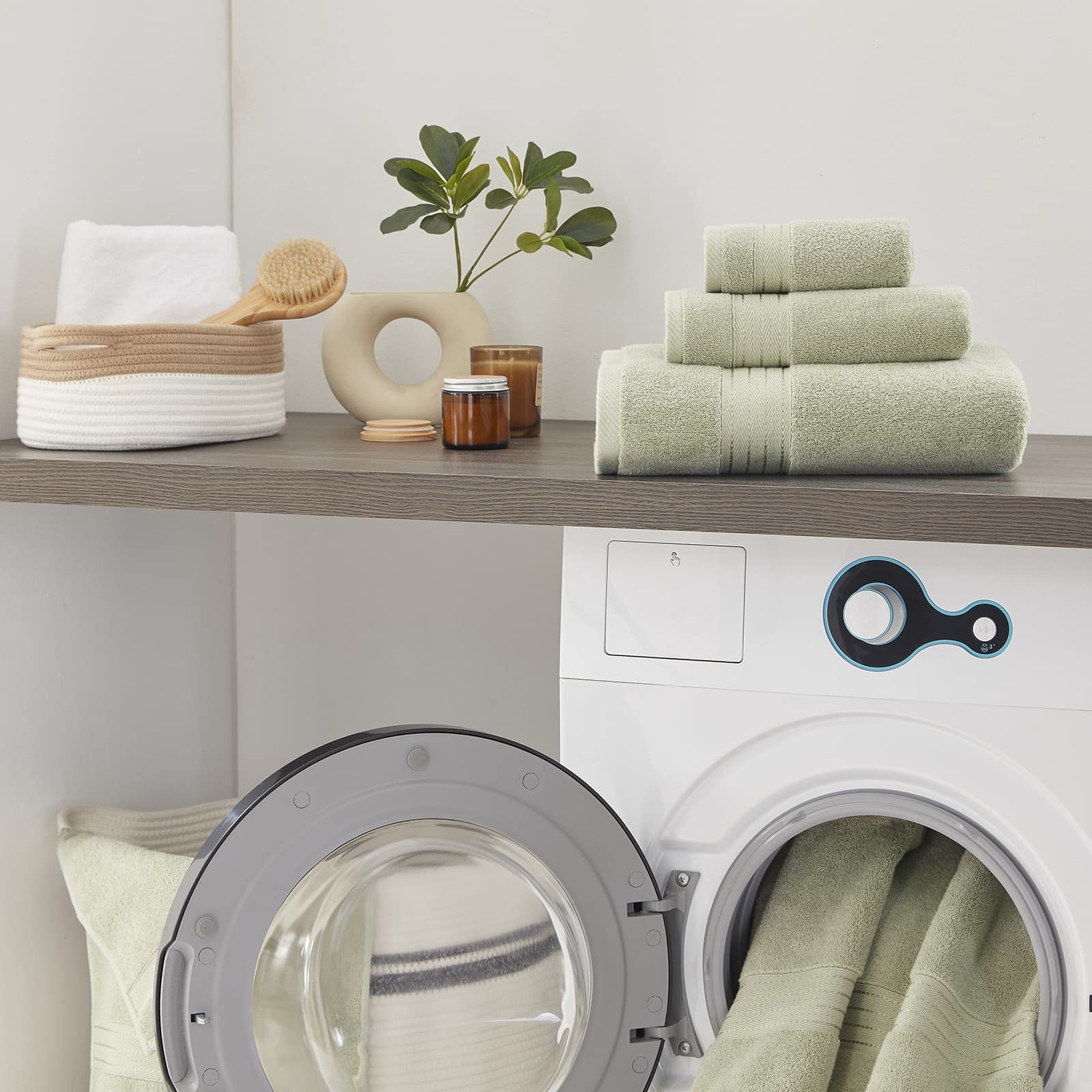 COZYART towel edge shows durable double-stitched hem detail.
