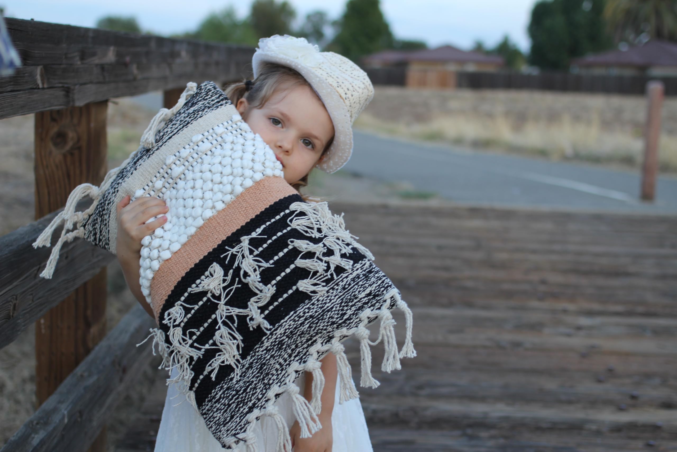 COZYDEKO lumbar cover shows braided detail for an artisanal look.
