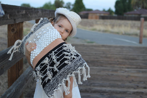 COZYDEKO lumbar cover shows braided detail for an artisanal look.