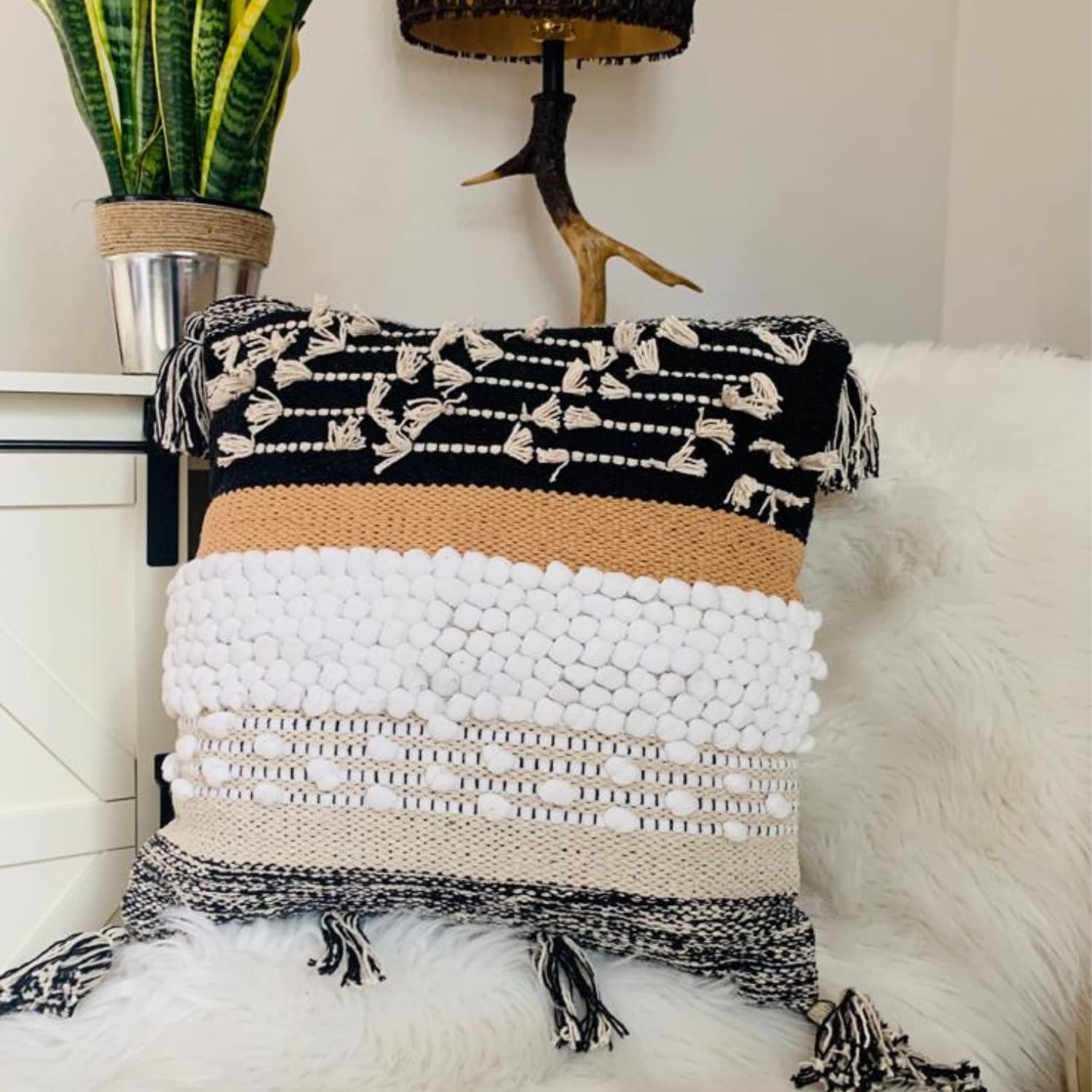 Living room setup with COZYDEKO pillow cover on a sofa