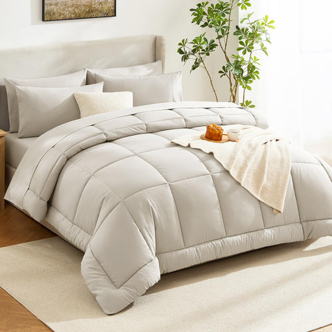 Beige CozyLux bedding provides all-season warmth with a soft microfiber feel.