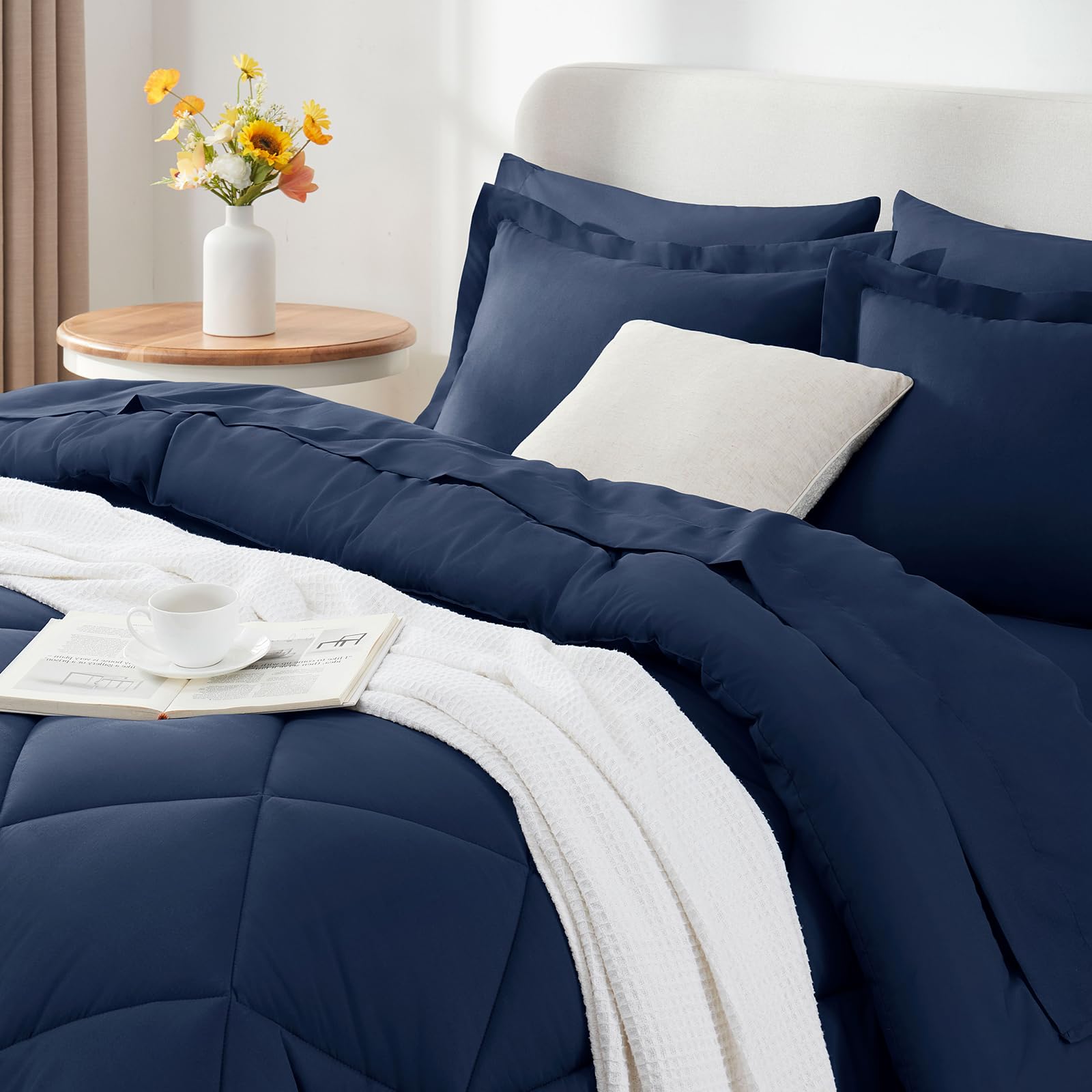 CozyLux navy bed-in-a-bag display suggests easy year-round care.
