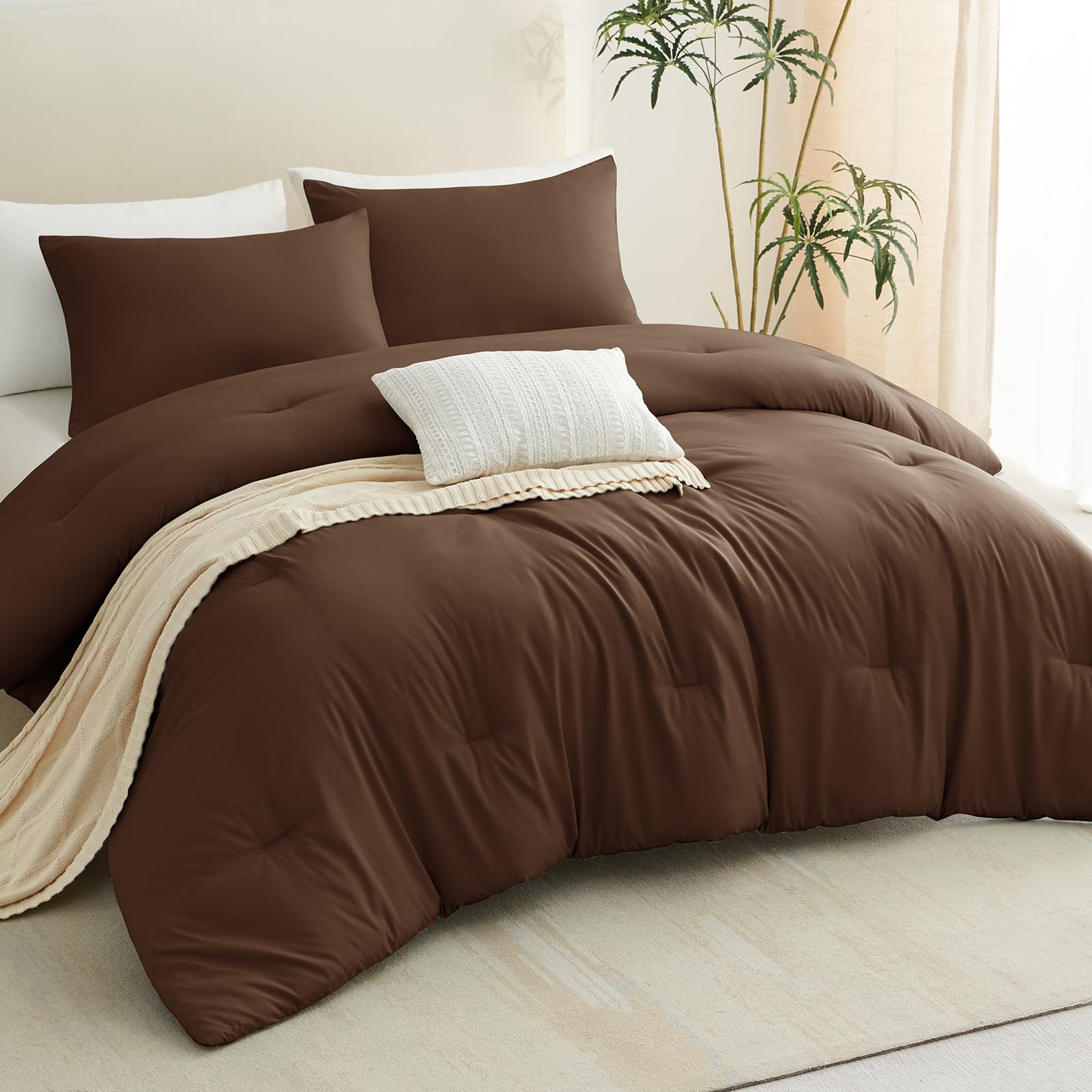 CozyLux bedroom scene in warm light illustrating inviting all-season comfort