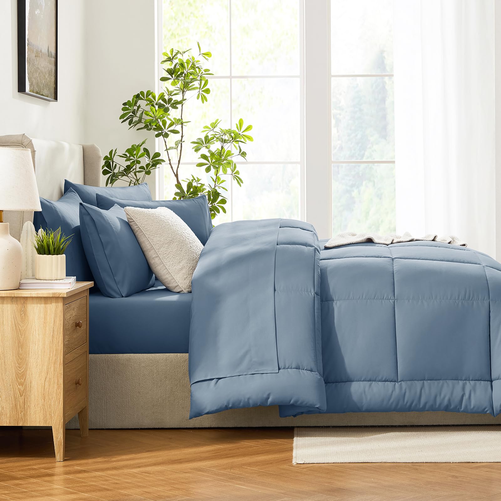 CozyLux dusty blue bedroom scene showcasing inviting all-season bedding.