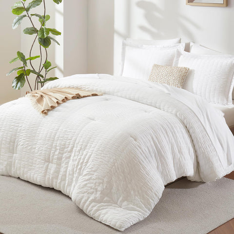 CozyLux California King comforter set in vacuum package, ready for easy setup and storage.