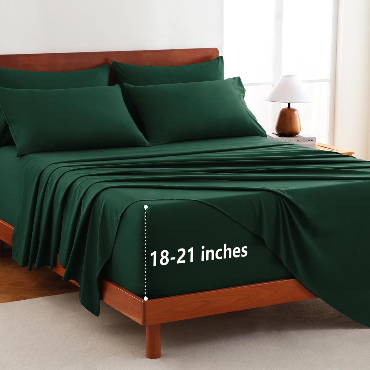 CozyLux extra-deep-pocket king sheets folded to show a secure fit and premium microfiber.