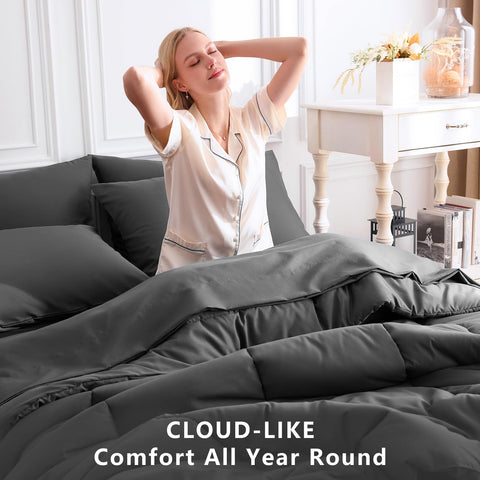 CozyLux flat sheet in dark grey coordinates with the comforter.