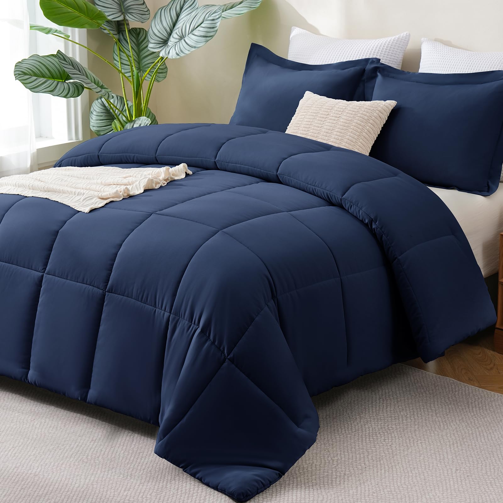 CozyLux full-size navy blue comforter for year-round softness.
