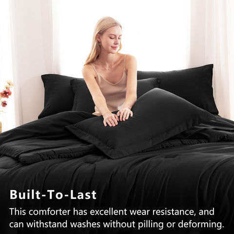 CozyLux fitted sheet in black ensures secure fit and easy care