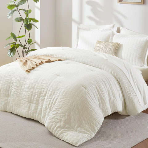 CozyLux full-size ivory seersucker comforter set with seven pieces for all-season warmth.