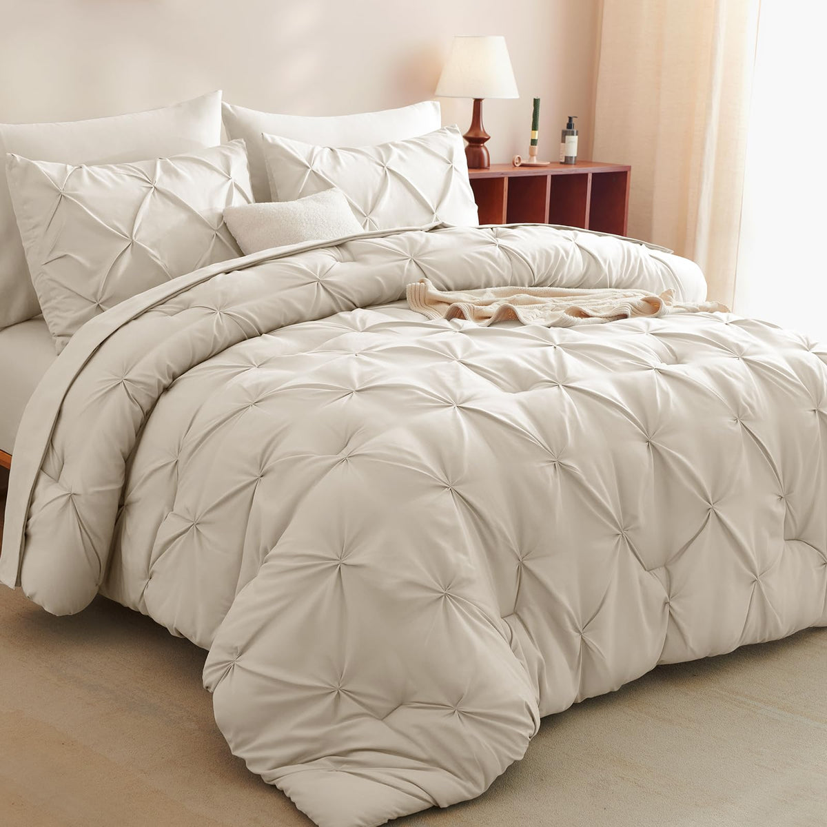 CozyLux king beige pinch-pleat comforter adds a sophisticated, cozy bedroom look.