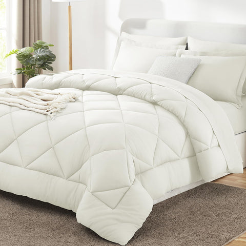 CozyLux king-size ivory comforter close-up showing plush, breathable warmth.