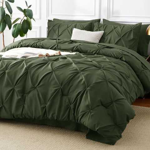 CozyLux king size comforter set in olive green with pinch-pleat detail for a luxurious bedroom look.