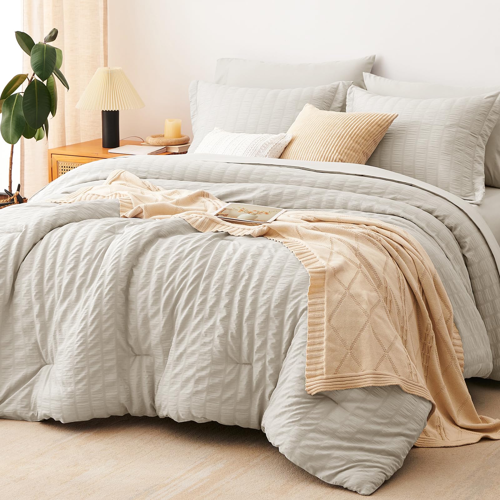 CozyLux oversized queen comforter beige seersucker texture, adding warmth and style to the bed.