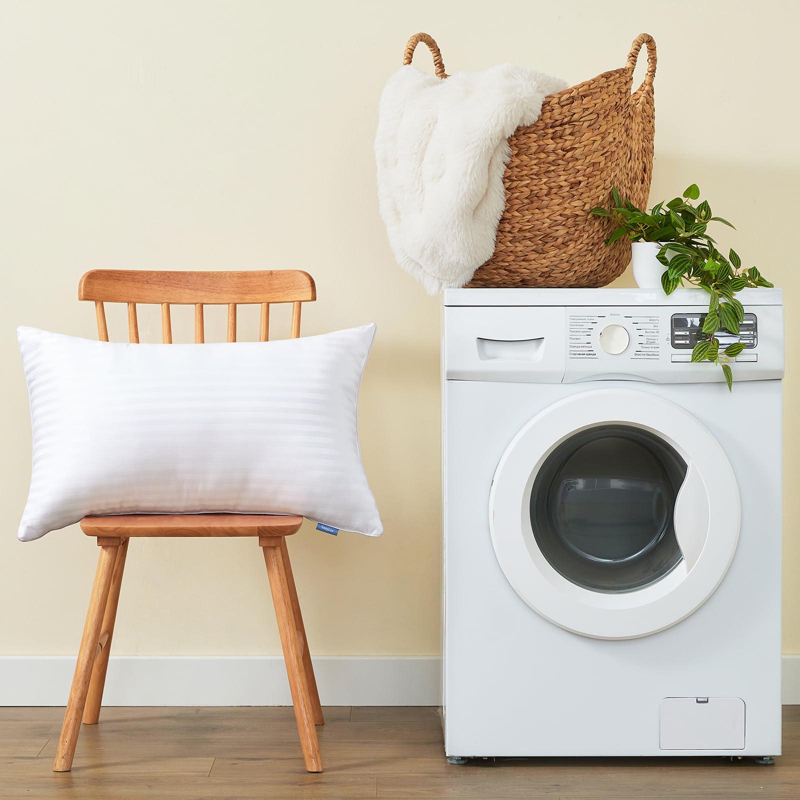 CozyLux pillow on bed with sheets shows standard size fit for standard cases.