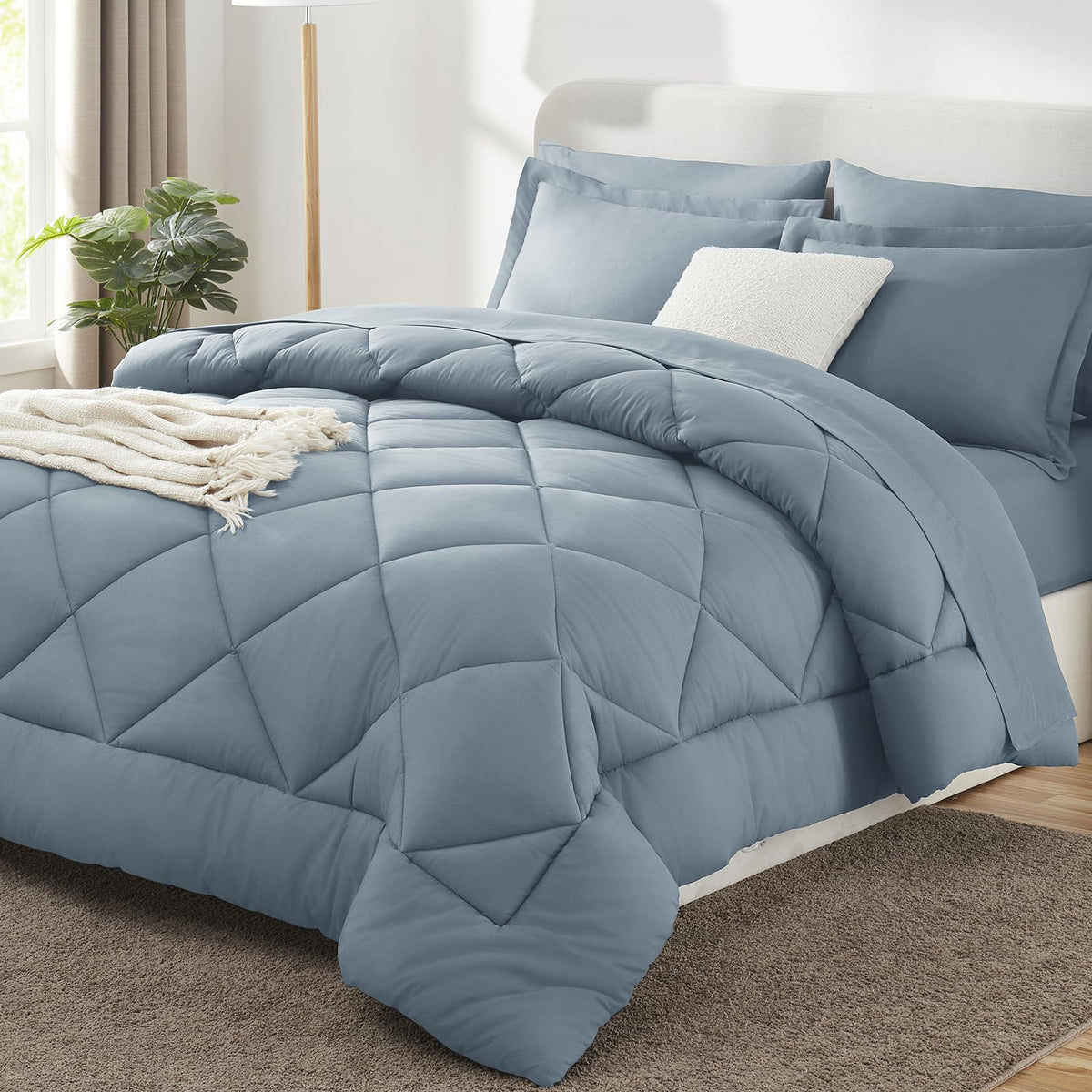 CozyLux queen comforter in dusty blue with plush warmth and a smooth surface