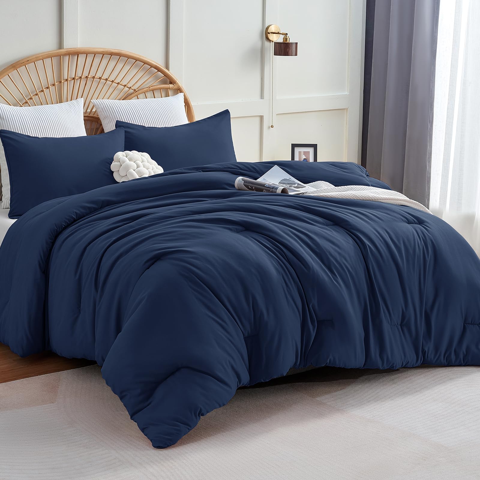 CozyLux queen navy blue comforter folded for a clean, inviting look and soft touch