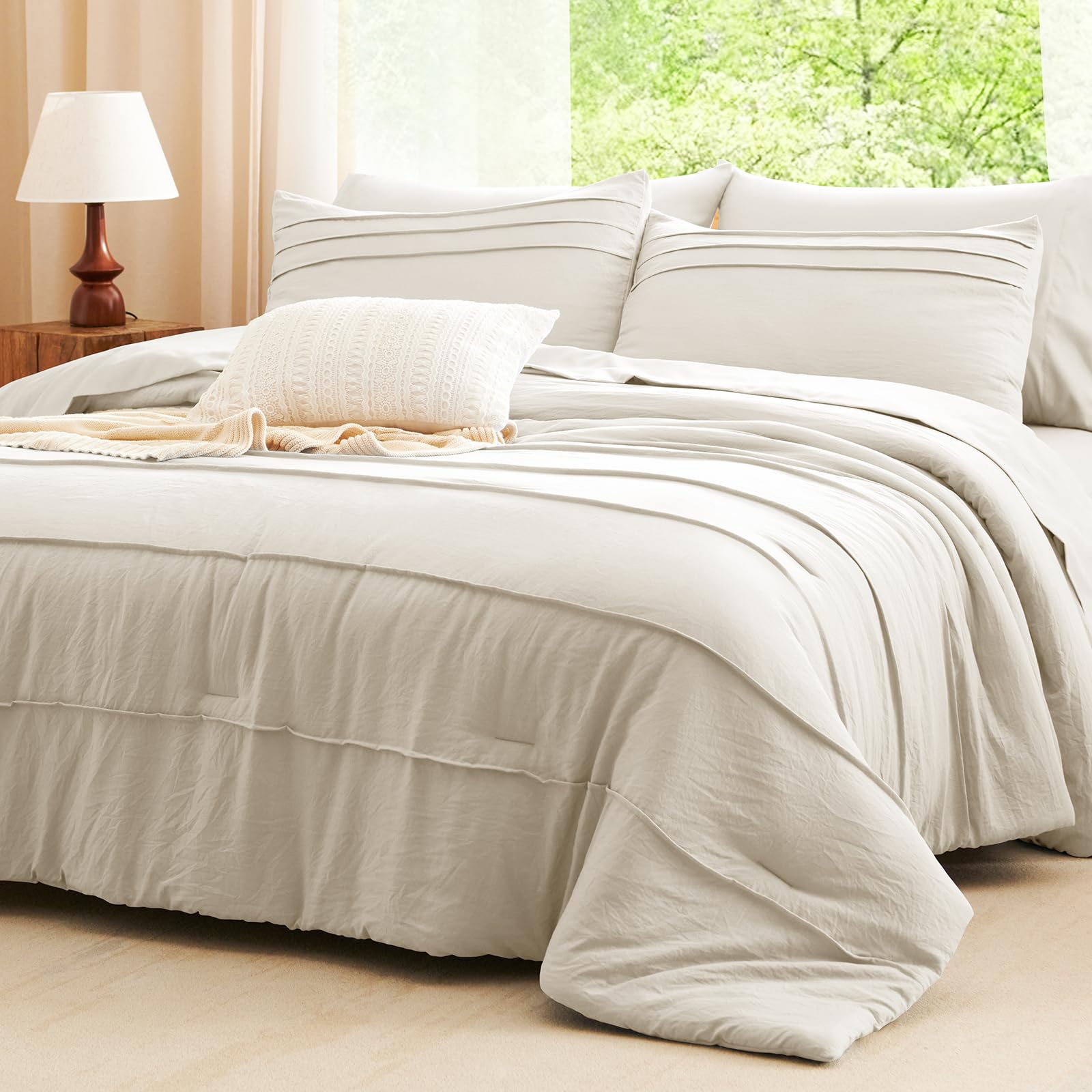 CozyLux queen beige shams complete an elegant bed display.