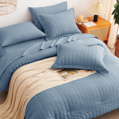 CozyLux dusty blue tones add modern elegance to a bedroom.