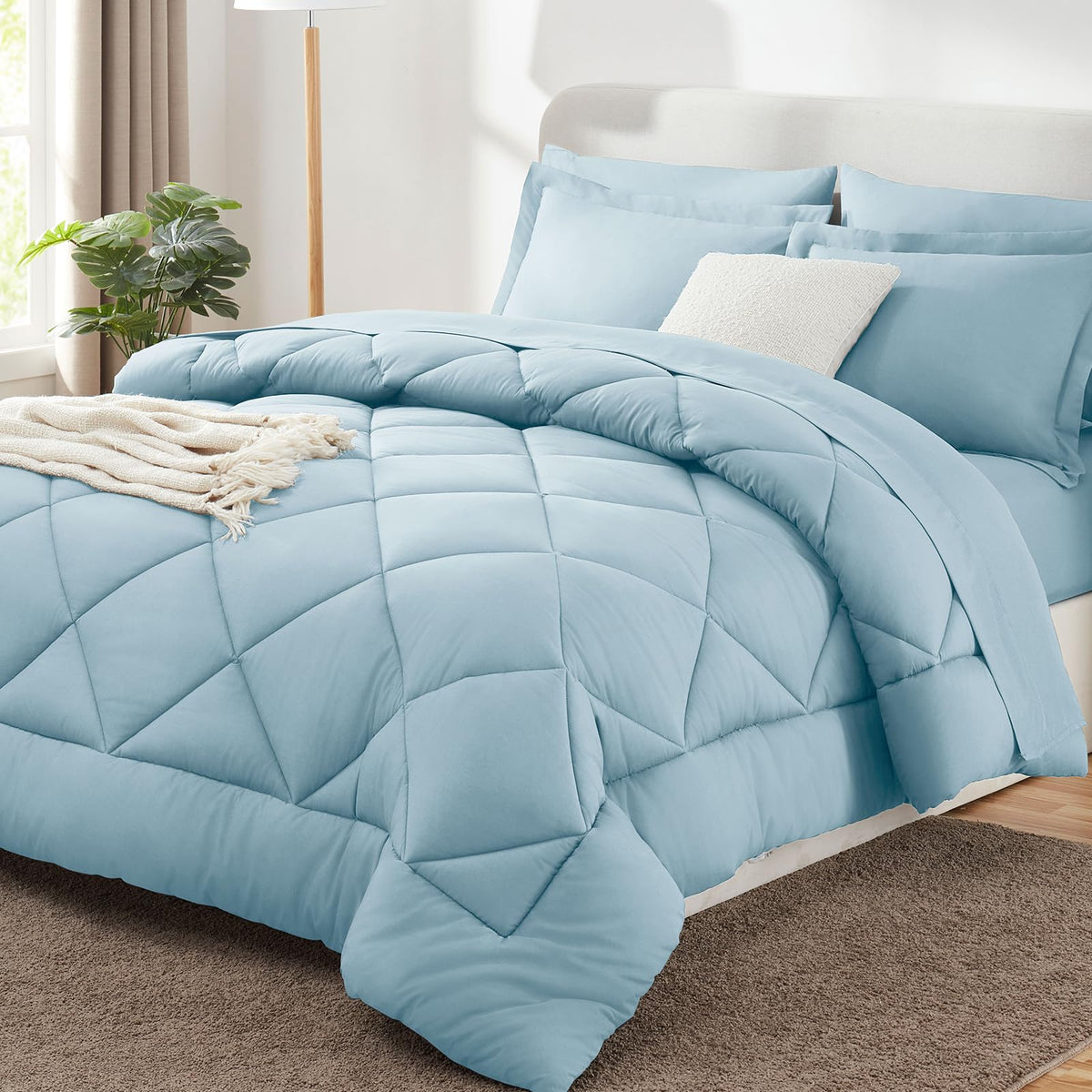 CozyLux Queen Comforter Set light blue front view showcases breathable luxury.