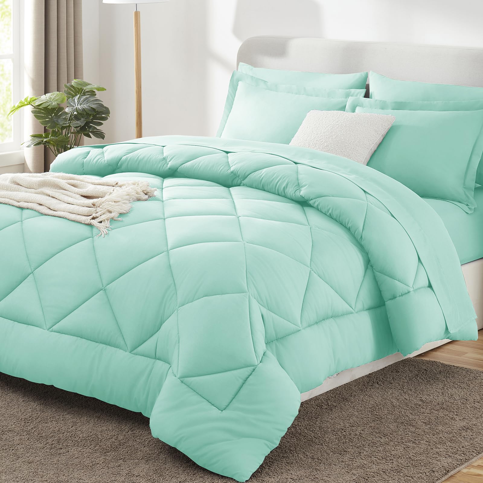CozyLux queen comforter set in mint green on bed for a fresh, inviting look.