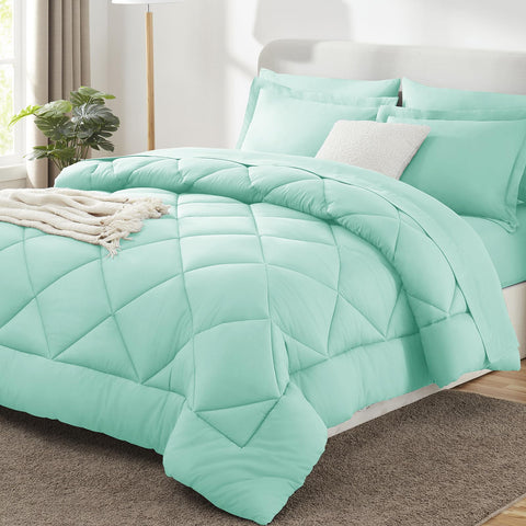 CozyLux queen comforter set in mint green on bed for a fresh, inviting look.