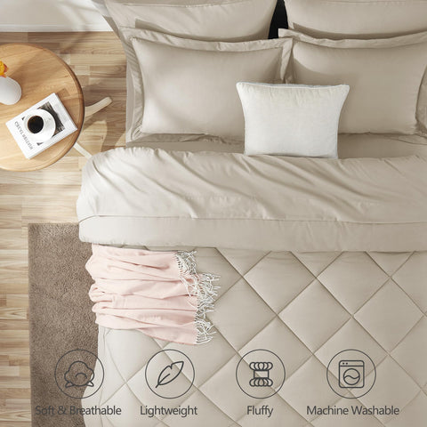 CozyLux Queen Comforter Set Oatmeal on-bed view highlighting plush texture for cozy nights.
