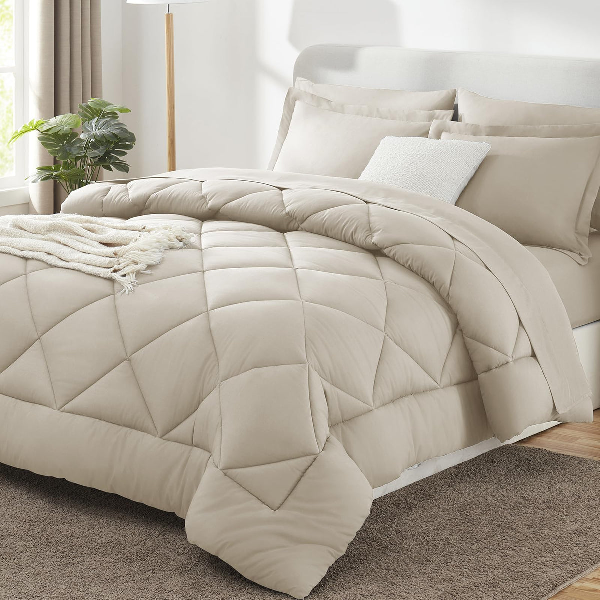 CozyLux Queen Comforter Set Oatmeal fabric close-up showing soft, breathable microfiber for year-round comfort.