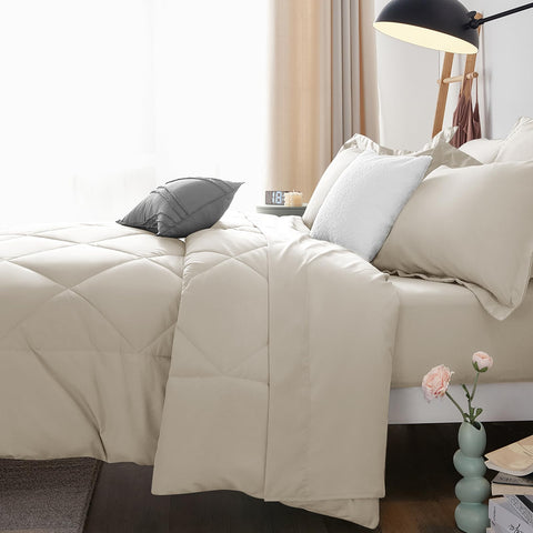 CozyLux Queen Comforter Set Oatmeal night ambience shows inviting all-season setup.