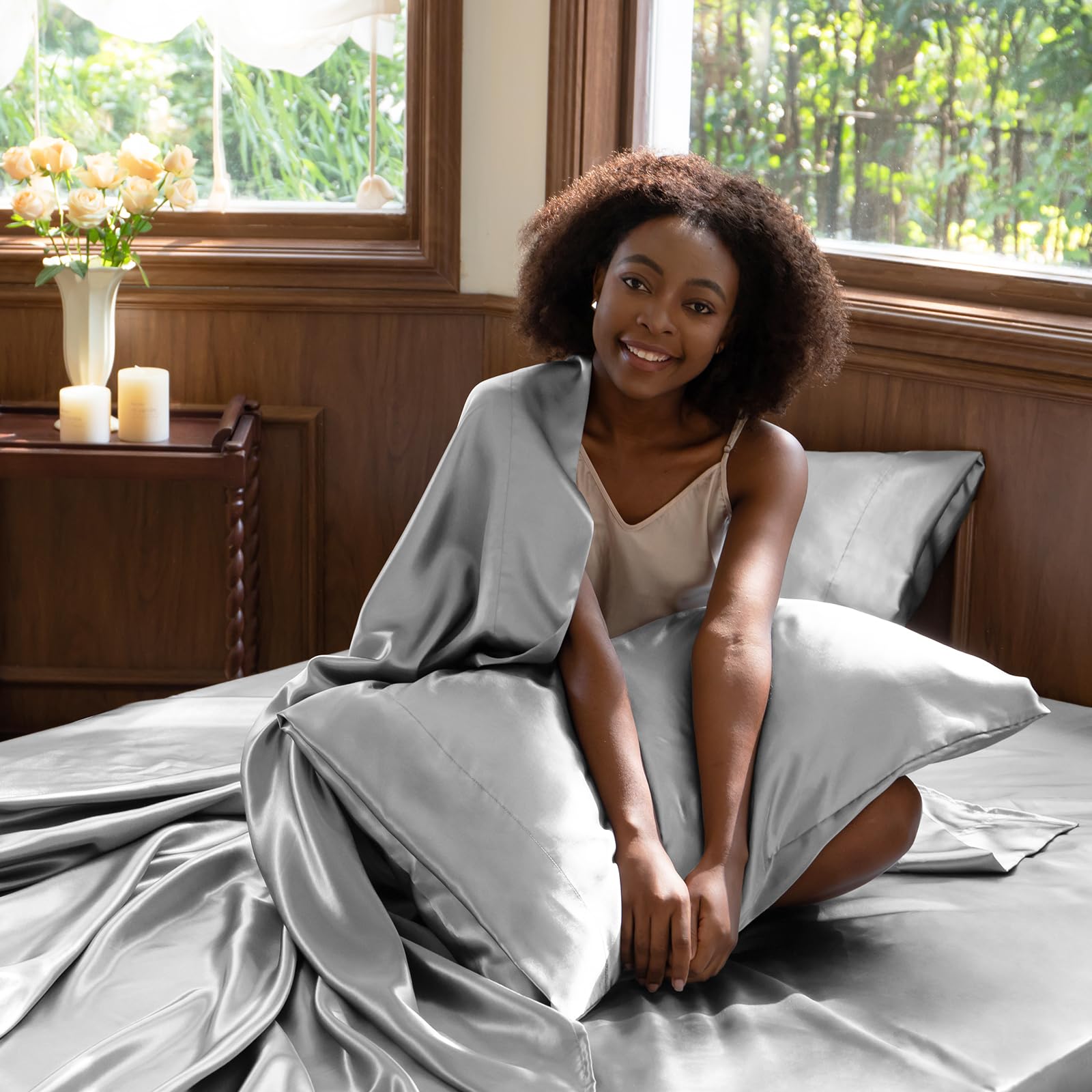 CozyLux satin sheets on a queen bed showcase luxurious shine and comfort.