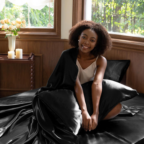 CozyLux satin sheets two pillowcases display soft edge finish.