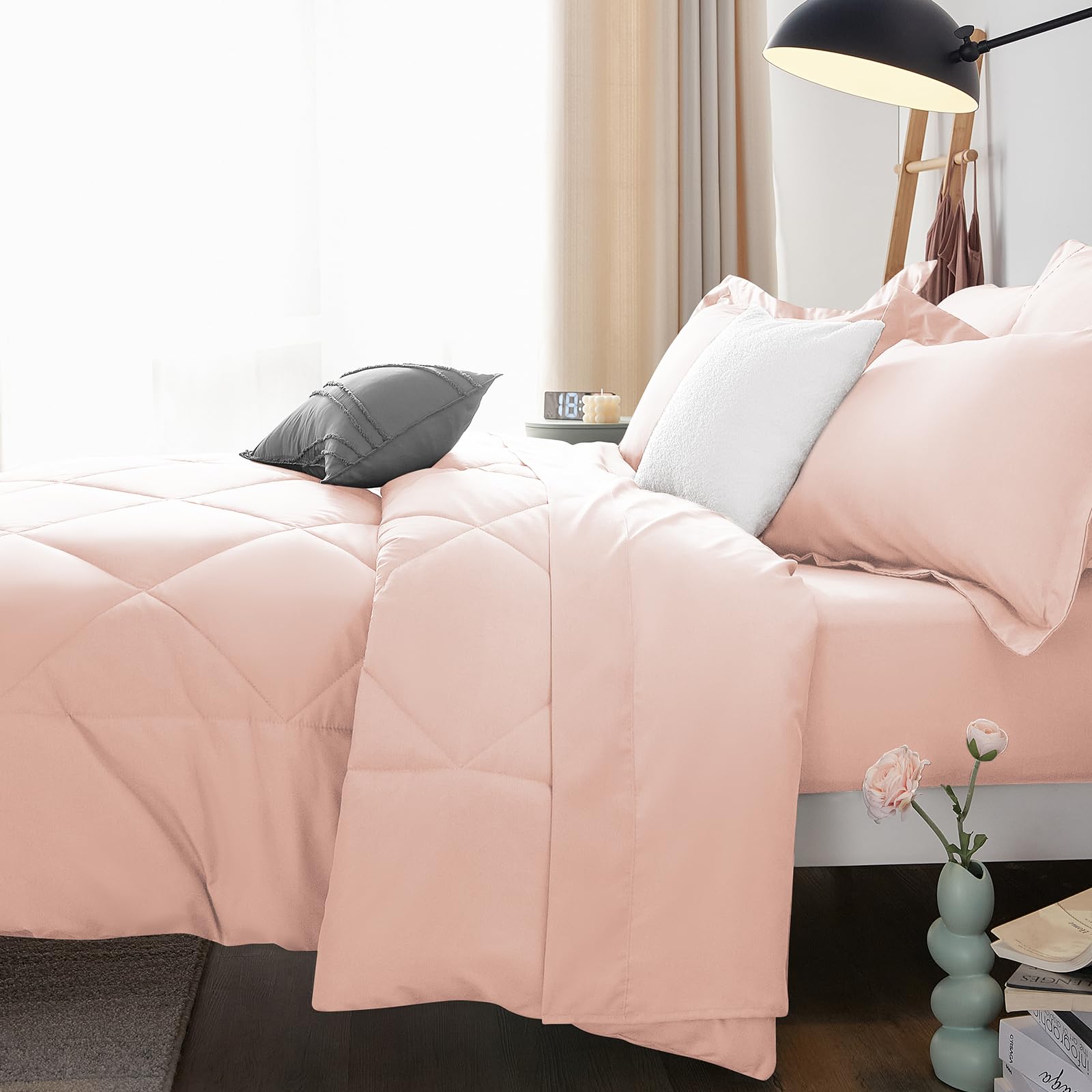 CozyLux soft microfiber texture shown in hand to convey luxury touch.