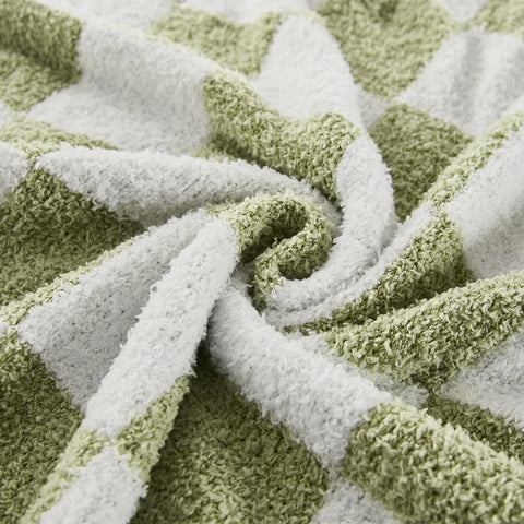 Cozzenity checkered throw blanket sage green folded neatly for compact storage