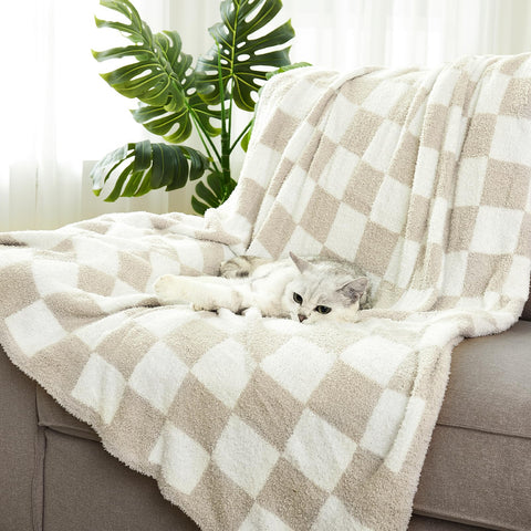 Cozzenity travel picnic blanket suited for outdoor use and portability.