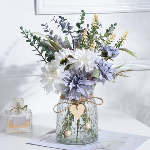 COZZI CODI fake blue flowers bouquet in a glass vase enhances living room decor.